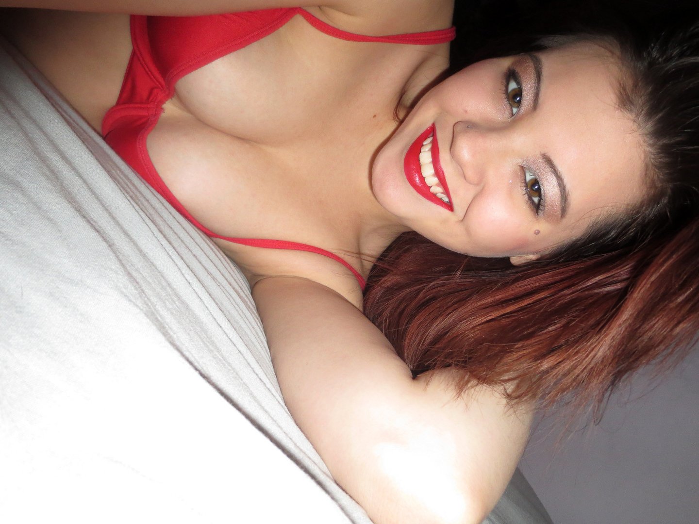 Sydney Mai Teasing In Some Sexy Red Lingerie Photos
