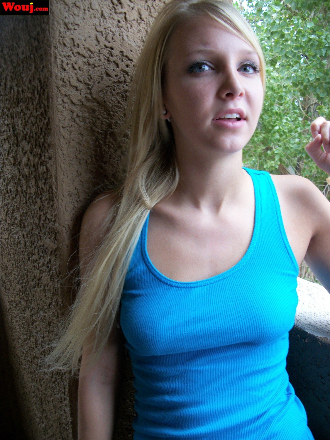 Lovely Blonde Babe Posing In A Blue Shirt Outdoors Photos