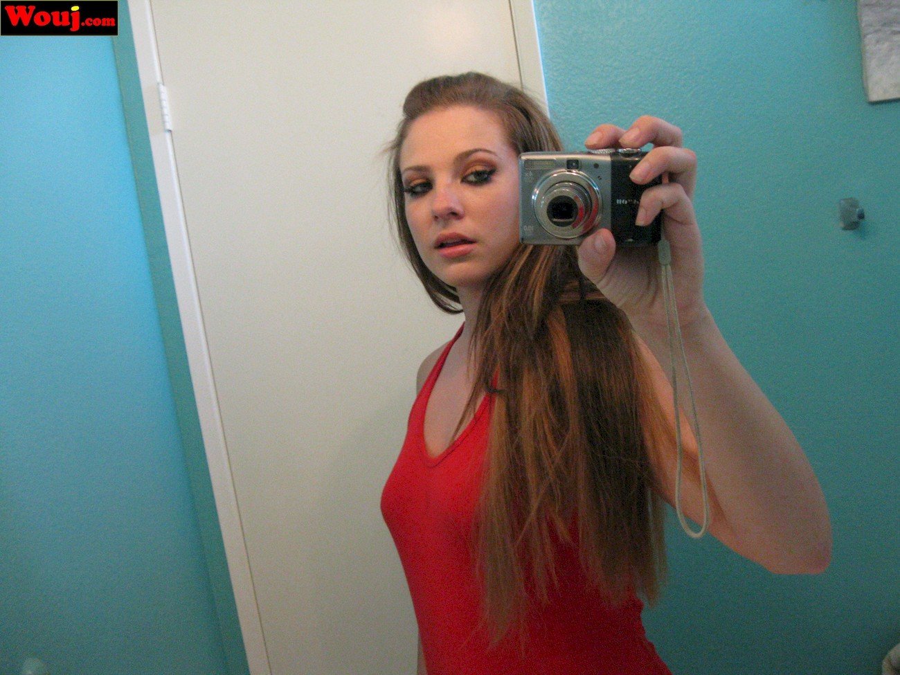 Hot Brunette Chick Loves Teasing With Her Big Cleavage Photos