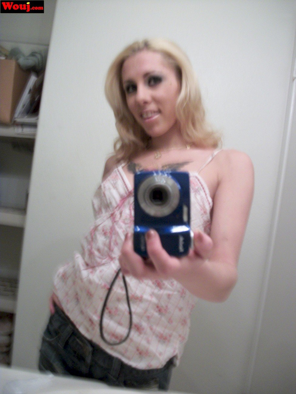 Stunning Blonde Girl Taking Pics Of Herself In The Mirror Photos