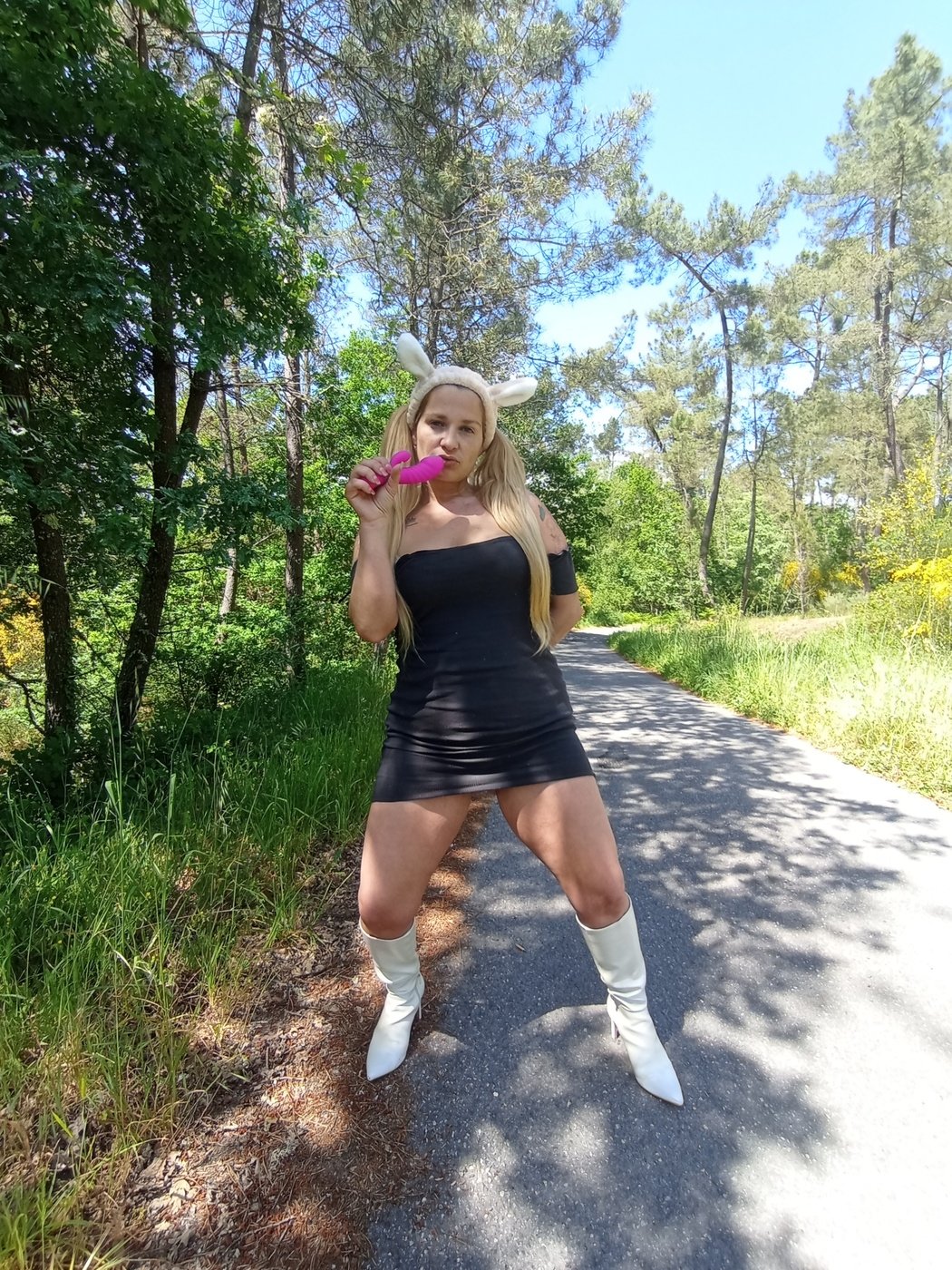 Sexy Blonde Babe With Big Butt Poses Seductively Outdoors Photos