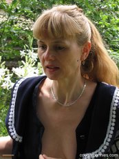 Stunning mature girl Doris Dawn unveils her nice figure outdoors — 11