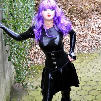 Rubber Doll outside looking lush in tight latex