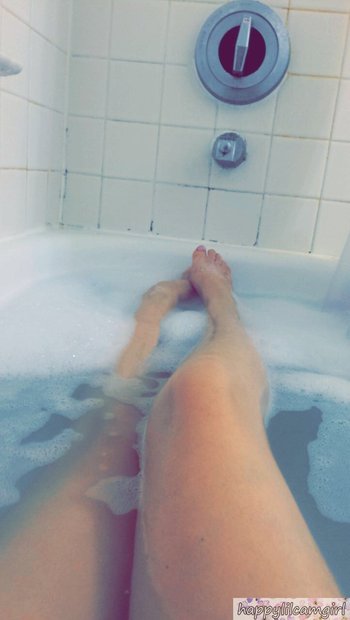 Beautiful brunette sweetie taking photos of herself in the bathtub - 000005