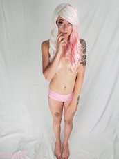 Tattooed girl Riley Cyriis posing in various outfits — 13