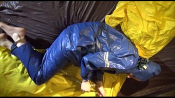 Submissive girl tied up in a shiny nylon rainwear - SNA-Rainbound-Rainwear%20(4)