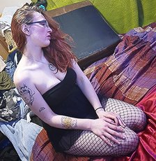 Redhead wife with glasses posing sexy in bed — 5