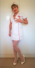 Hot nurse Lorna Blu teasing a patient with her sexy curves — 2