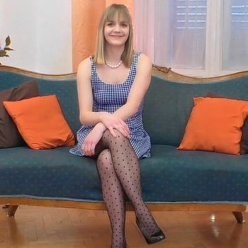 Lucette Nice lifts up Legs in patterned Pantyhose