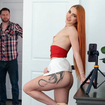 Foxy redhead Little Dragon caught topless and fucked hard on the bed