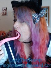 Lady The Tramp wearing a cute uniform while playing with a toy — 5