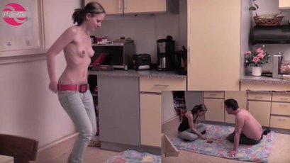 Young couple having sex on the kitchen floor — 1