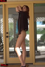 Sweet hottie showing her amazing figure in a dress outdoors — 14