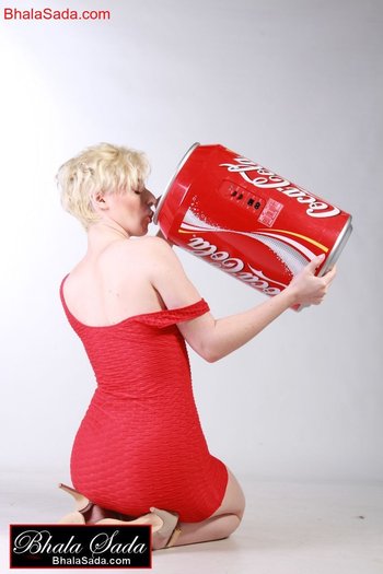 Smoking hot blonde girl loves posing with a big coke can - 000004
