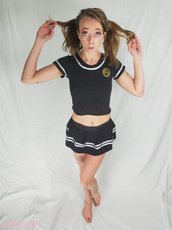 Tattooed girl Riley Cyriis posing in various outfits — 9