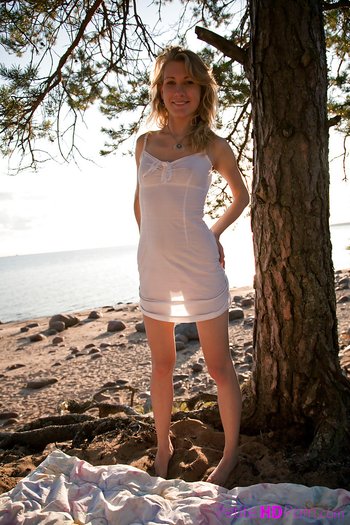 Lovely young girl Mariana strips and shows her shaved pussy on the beach - Lovely young girl Mariana strips and shows her shaved pussy on the beach 009