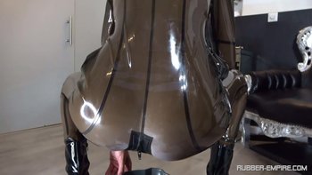 Chicks in rubber costumes have golden shower fun - Rubber-Empire-Latex%20(15)