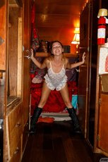 Brunette Renee Wilson having fun doing striptease and showing her tits — 2