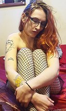 Redhead wife with glasses posing sexy in bed — 12