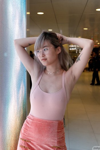 Barbie Qu seductively teases with asian Upskirt