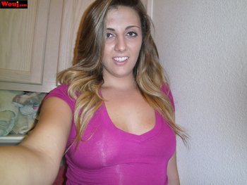 Two good looking girls love posing fully clothed