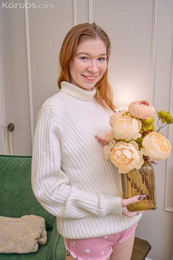 Sweet Mia Murkovski with natural tits and shaved pussy fingering her clit 002