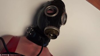 Chick poses wearing red latex dress and gasmask - Club-Rubber-Restrained-Latex%20(3)