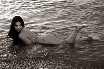 Sexy bikini  babe strips off for a swim in the cool ocean - 000008.jpg