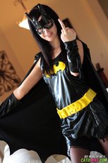 Sexy Batgirl Catie Minx strips to her black Stockings — 2