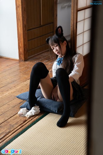 Ria Kurumi masturbates alone in a cute cosplay outfit 009