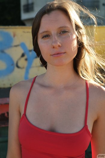 Brunette Tami Fruit with natural tits and hot ass posing on the streets 007