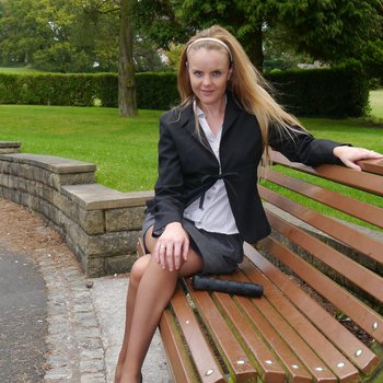 Stiletto girl in black heels showing lush legs