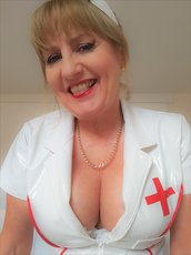 Hot nurse Lorna Blu teasing a patient with her sexy curves — 3