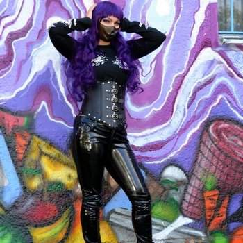 Rubber Doll outside posing in damn tight Latex