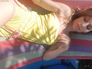Sweet babe Naughty Adeline showing her nice boobies outdoors - 000021