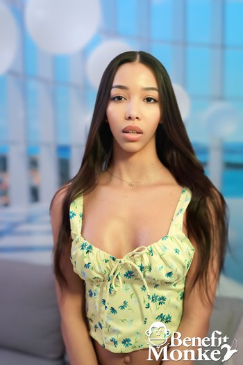 Beautiful solo girl Lia Lin taking off her top to show her amazing boobs
