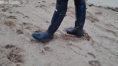 Red haired MILF walks in mud wearing rubber boots — 13