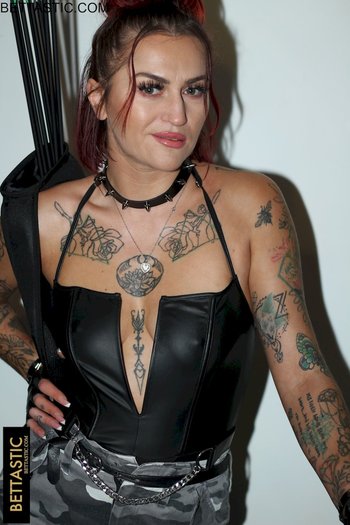 Redhead beauty showing her tattooed body for Bettastic
