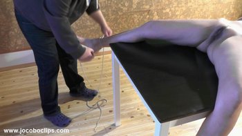 Naked submissive is stretched on the wooden table - Jocobo-Tied-To-The-Table%20(6)