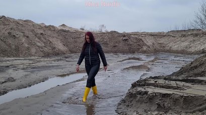 Red haired MILF walks in mud wearing rubber boots — 3