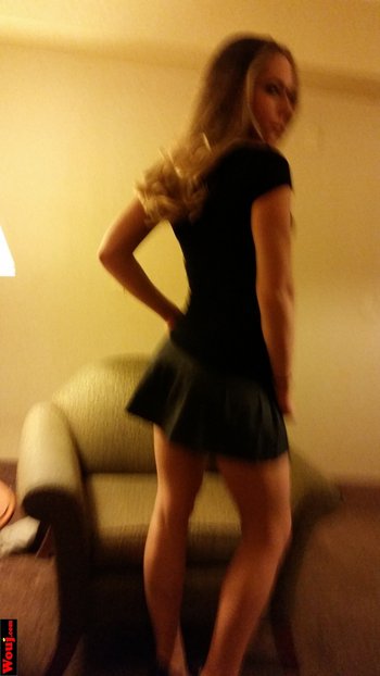 Hot blonde amateur in black dress poses seductively for the camera - 000004