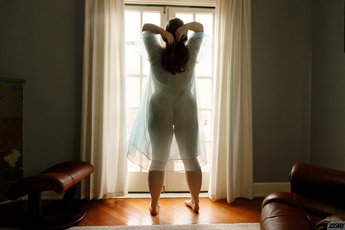 BBW Rose Fessenden teases with curves in negligee — 1
