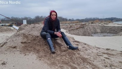 Red haired MILF walks in mud wearing rubber boots — 7