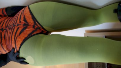 Solo hottie loves posing in her tight tiger outfit and green tights — 10