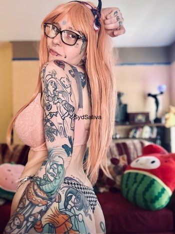 Redhead hottie Syd Sativa showing off her smoking hot body