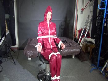 Hot girl is tied up in her shiny nylon rainwear - SNA-Rainbound-Nylon (1)