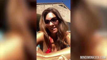 Busty MILF Mindi Mink takes a hot selfie in a red bikini — 1