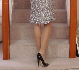 Blonde Model posing on the Stairs in high Heels — 5