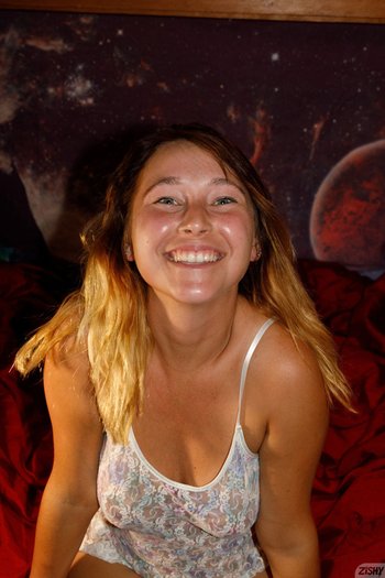 Brunette Renee Wilson having fun doing striptease and showing her tits 004