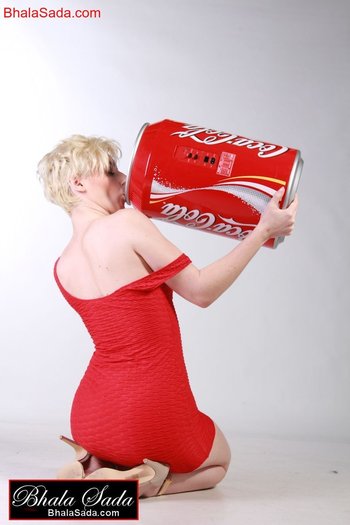 Smoking hot blonde girl loves posing with a big coke can - 000005